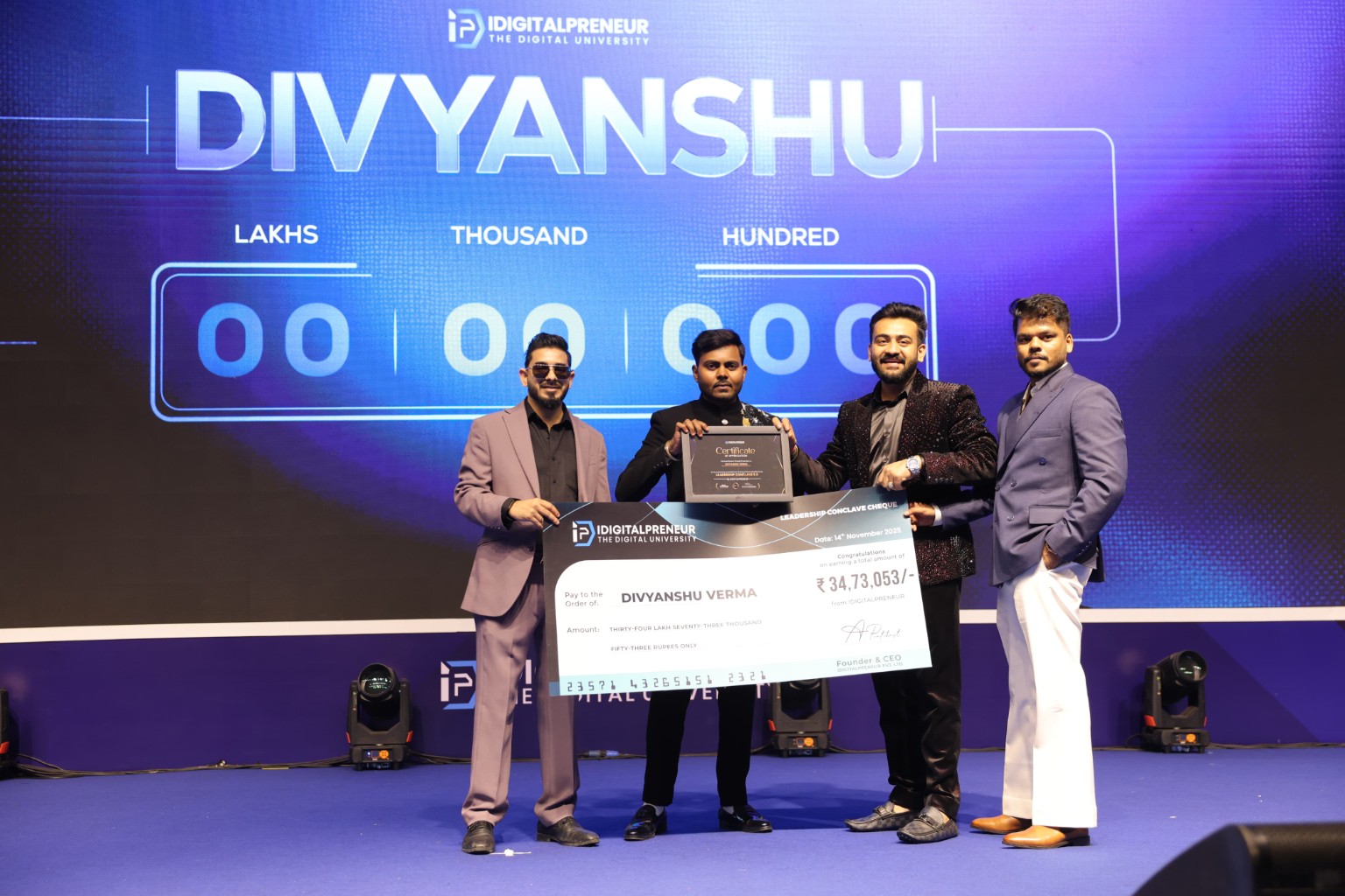 Divyanshu Verma with certificate and achievement cheque